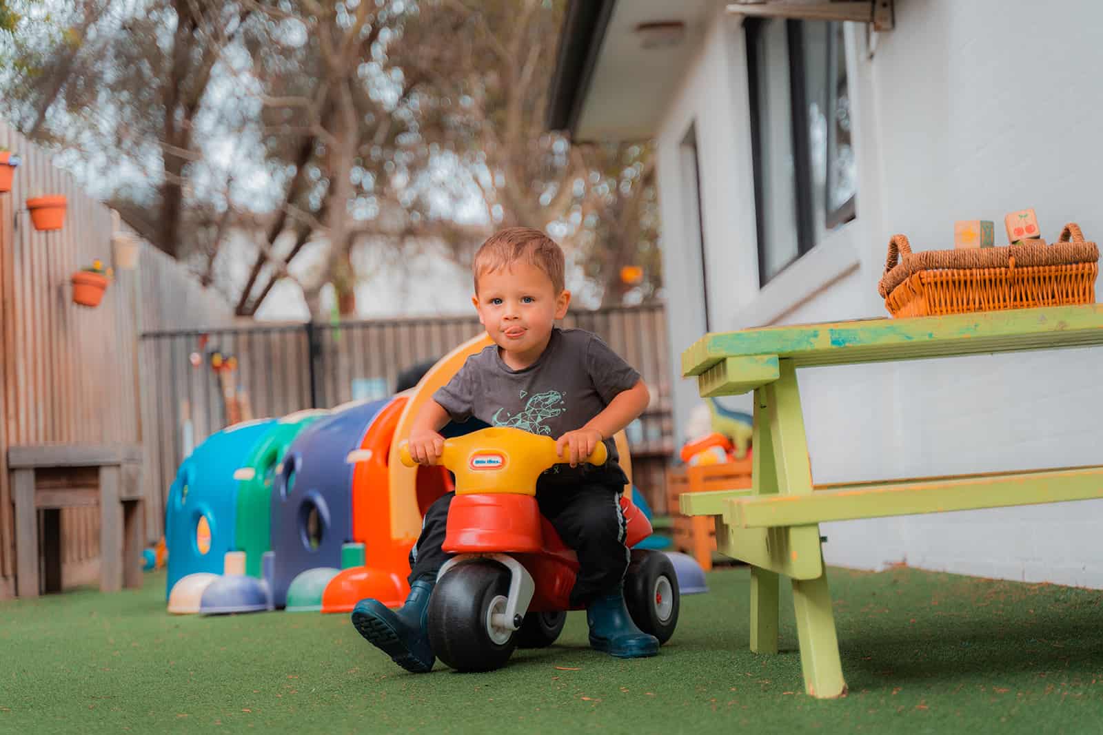 Child engaged in outdoor play at Mornington Kindergarten on Parwan Crescent